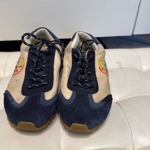 Tory Burch women’s sneakers size 9 1/2
Cream and multi color  logo